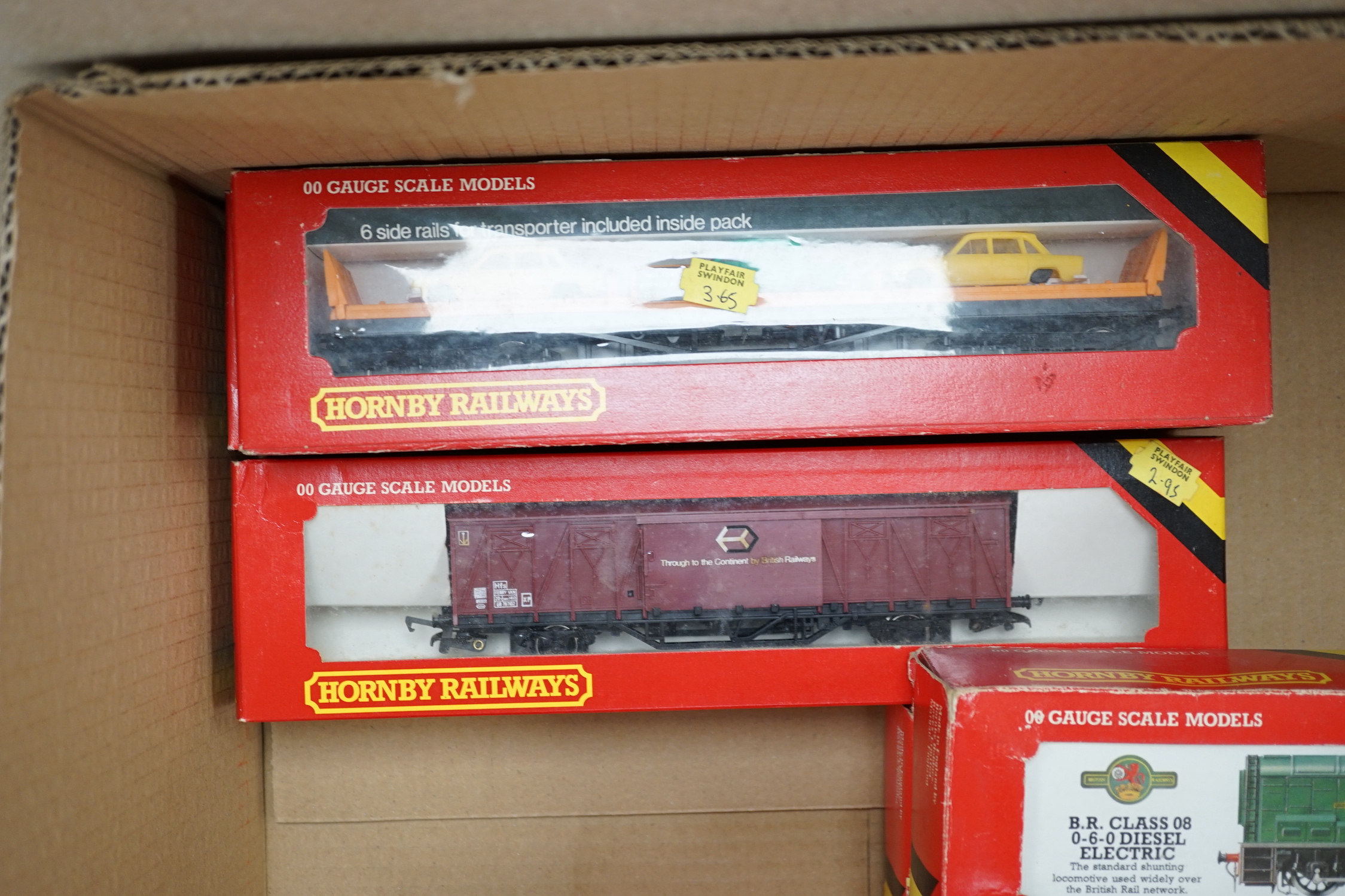 Thirty-six boxed Hornby railways 00 gauge items including five BR diesel locomotives; a Class 47 (R075), a Hymek (R074), a Class 25 (R068) and two Class 08 shunters (R156), together with fifteen freight wagons, twelve bo